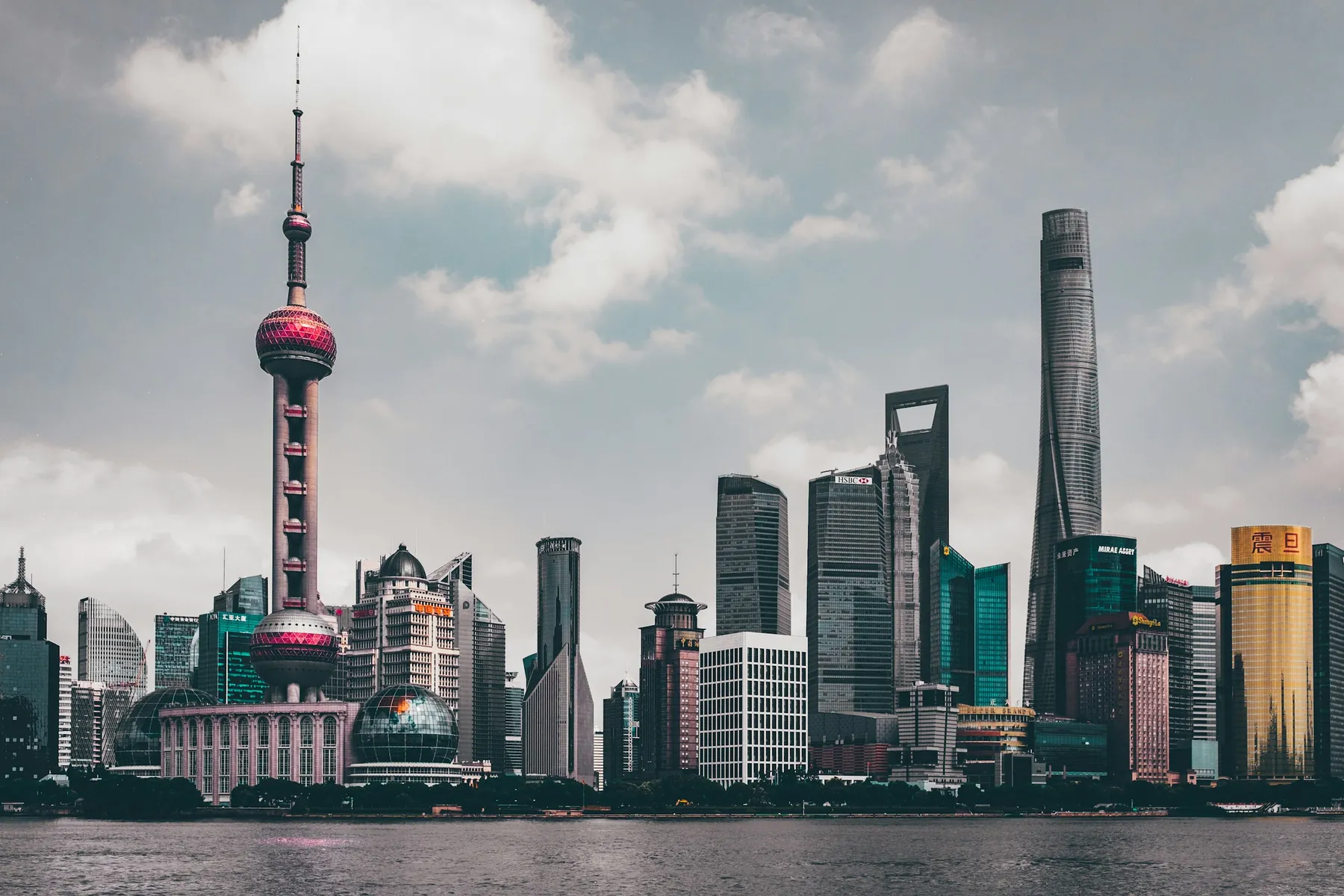 Shanghai’s business skyline across the Huangpu River in natural daylight